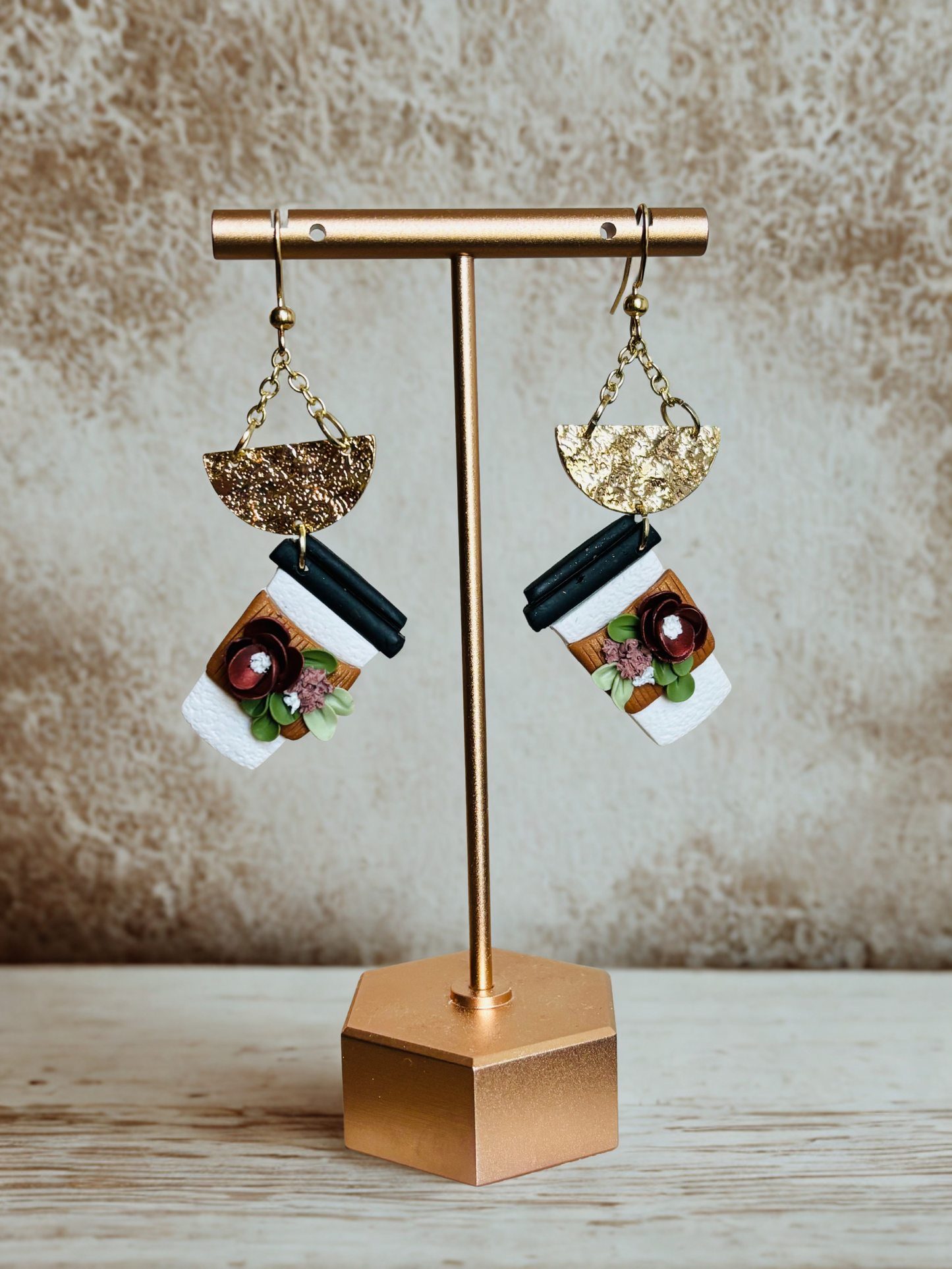 Handmade polymer clay coffee cup earrings with floral top and gold accents